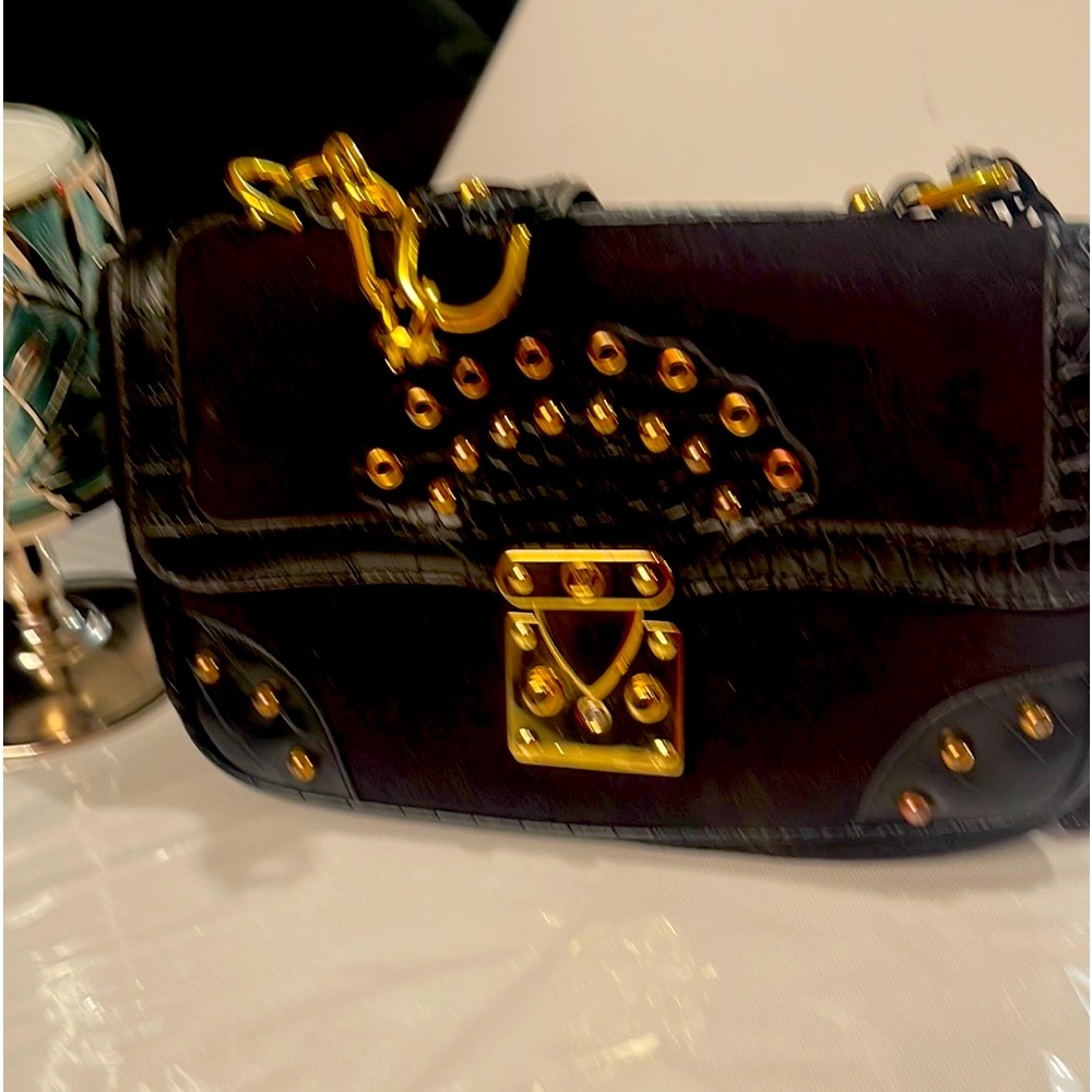 blk suede Bag w/gold color snap close/in 2 pockets 3rd zips/bottom 2worn marks!